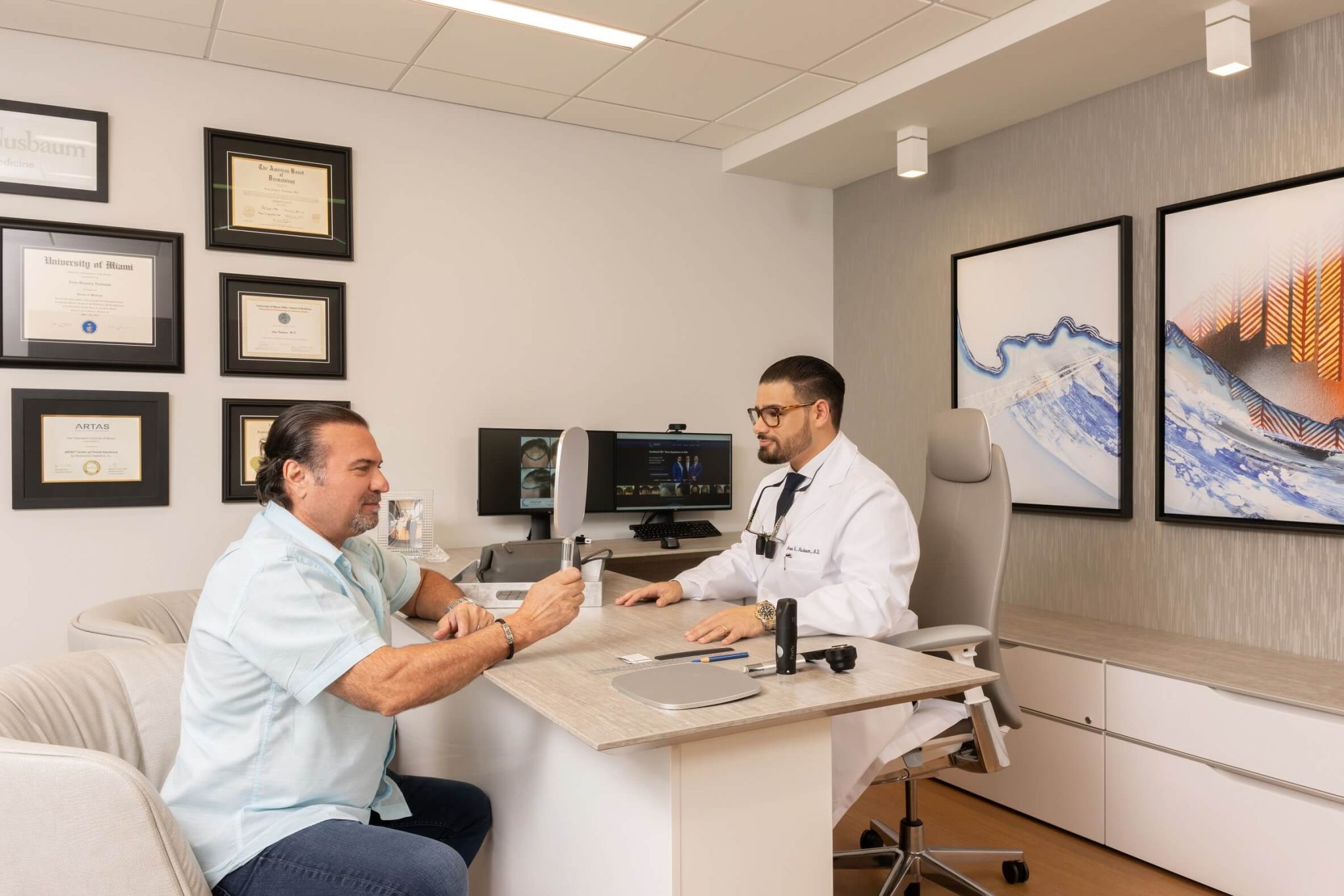 Patient consulting with a doctor in a modern clinic